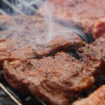 grilled meat on charcoal grill